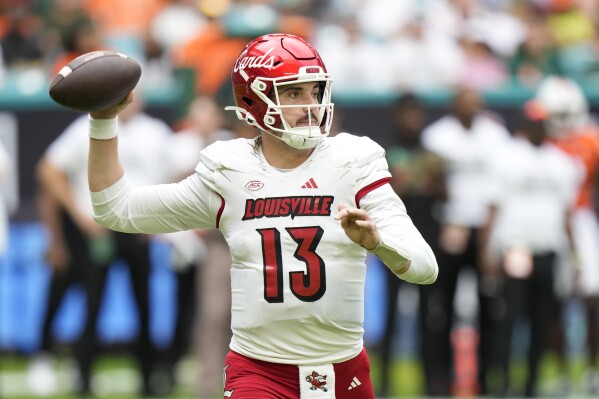 No. 9 Louisville tops Miami 38 31 to clinch spot in the ACC